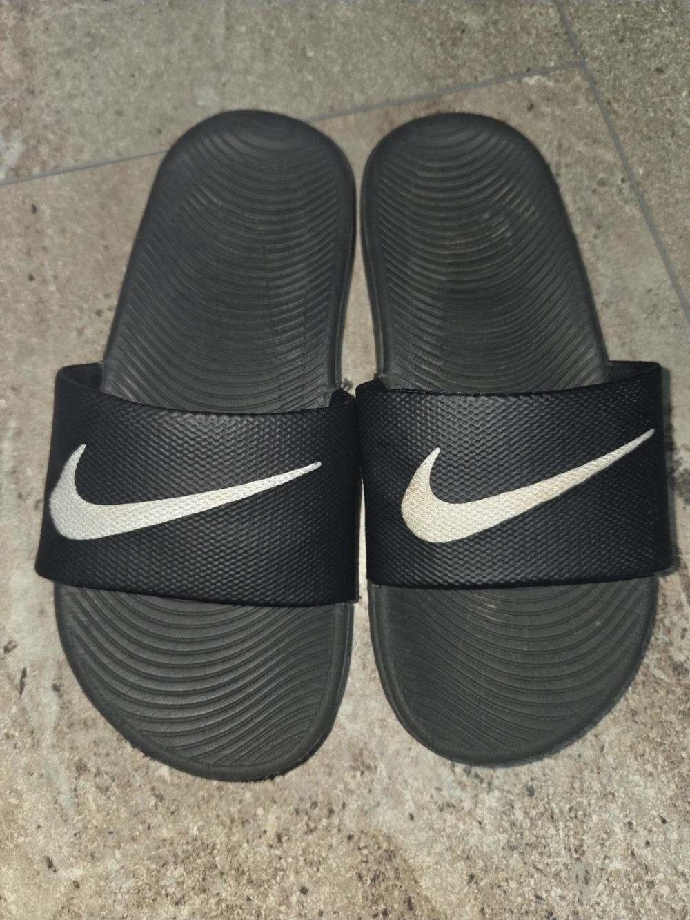 - Nike Kids Black Slides with White Swoosh